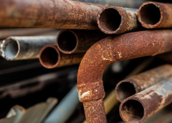 The prevention of the CO2-induced corrosion of carbon steel tubing