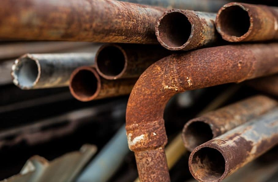 The prevention of the CO2-induced corrosion of carbon steel tubing