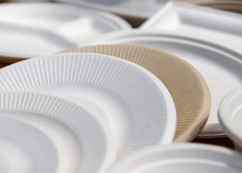 Propose new materials or technologies to make paper products waterproof and grease proof