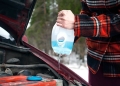 Propose a solution for a cost effective and eco friendly windshield washer fluid